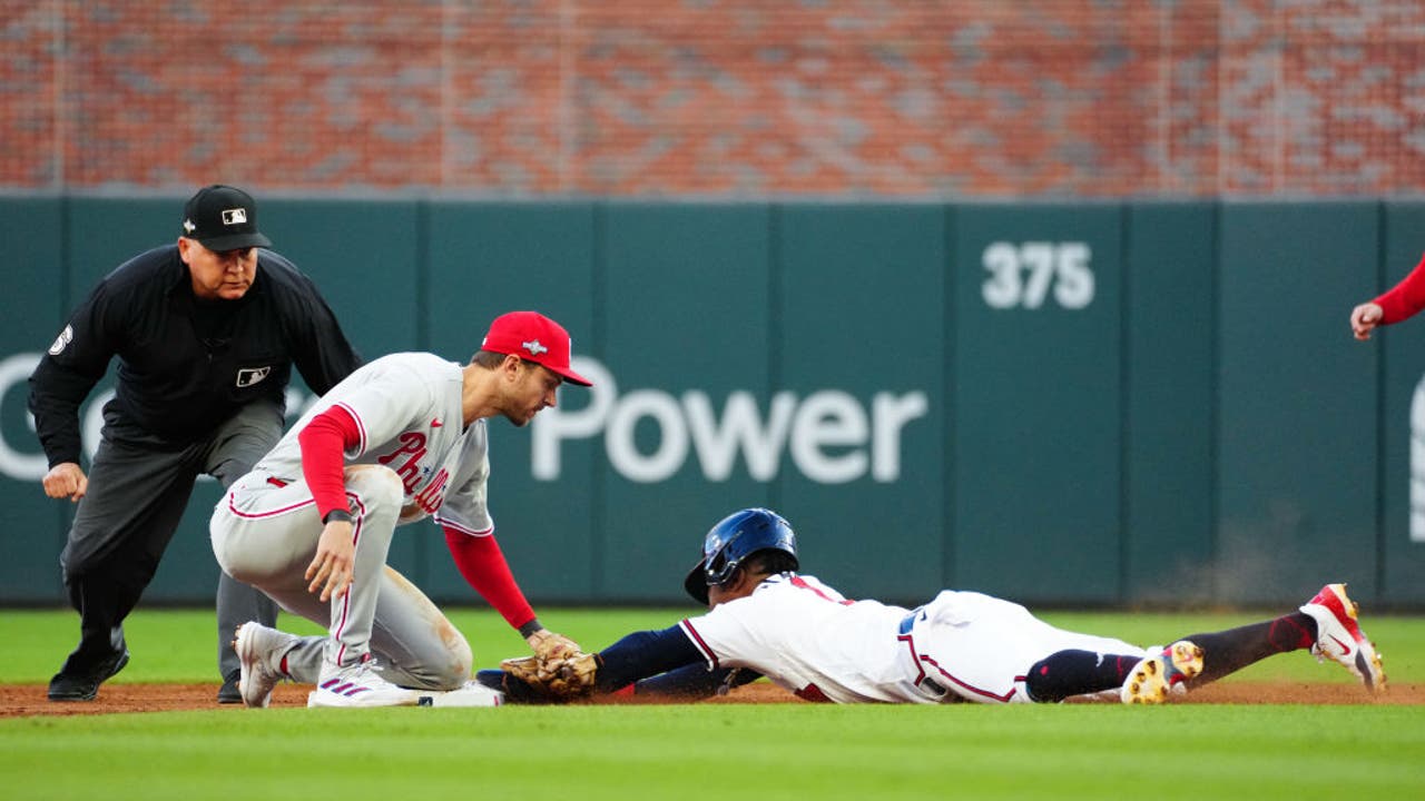Harper homers, Phillies shut down slugging Braves 3-0 in Game 1 of
