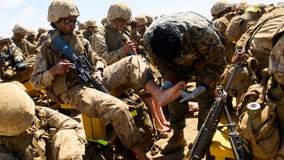 Marines inch grudgingly toward integrating women and men at boot camp