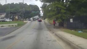 WATCH: Dramatic video shows Clayton County police officer helping victim after crash