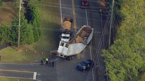 Milton road reopens after crash leaves tractor-trailer cracked in the middle