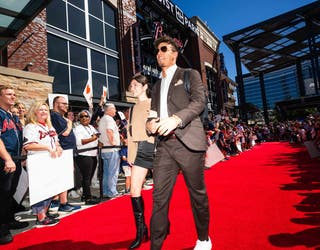 Atlanta Braves players walk out on red carpet at Truist Park