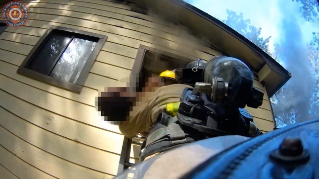 Watch: Cobb County Fire rescues man 'overcome by the smoke' in raging house fire
