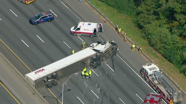 I-75NB blocked near SR 120 in Cobb County by overturned tractor-trailer