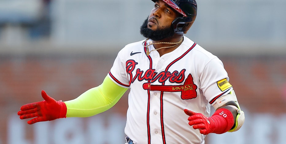 Marcell Ozuna of the Atlanta Braves in the dugout during the Major News  Photo - Getty Images