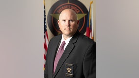 Georgia sheriff's candidate fired after hidden camera catches him sneaking into rival's locked office