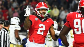 Milton runs for 156 yards and 2 TDs, No. 1 Georgia holds off Georgia Tech 31-23