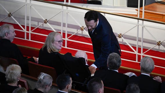 Former President Jimmy Carter emerges from hospice to attend wife's tribute service