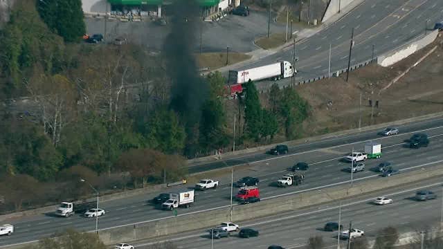 Brush fire near I-85, Cheshire Bridge Road results in heavy smoke