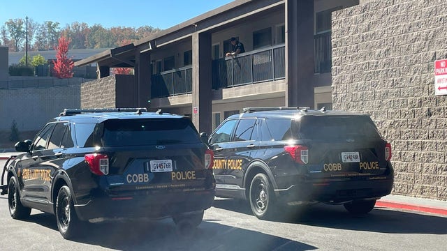 Man arrested after allegedly shooting clerk at Quality Inn in Cobb County identified