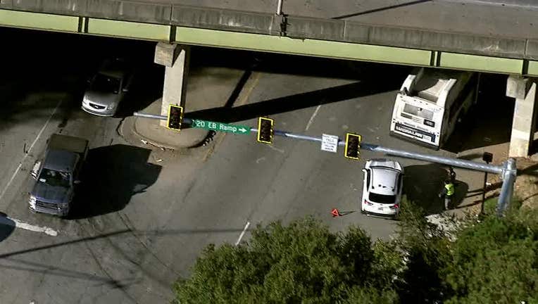 A MARTA bus can be seen under the I-20 overpass at Windsor Street SW in Atlanta after MARTA officials say a car cut it off and collided with it on Nov. 3, 2023.
