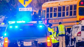 2 adults, 2 students taken to hospital after wreck involving school bus on Covington Highway