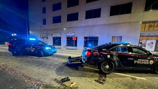 APD officers hospitalized after wreck at intersection, driver arrested