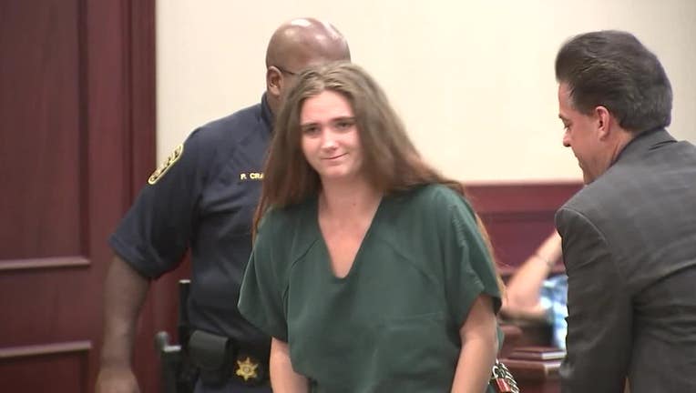 Hannah Payne, charged in a deadly road rage shooting along Riverdale Road, appears in a Clayton County courtroom on May 8, 2019.