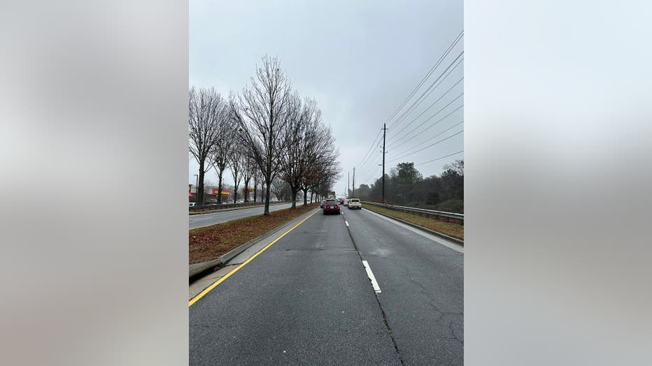 Traffic along Richard D. Sailors Parkway and New Macland Road came to a standstill after a carjacking and chase in Powder Springs on Dec. 26, 2023.