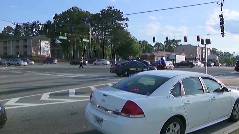 Clayton County police investigate a deadly road rage shooting along Riverdale Road on May 7, 2019.