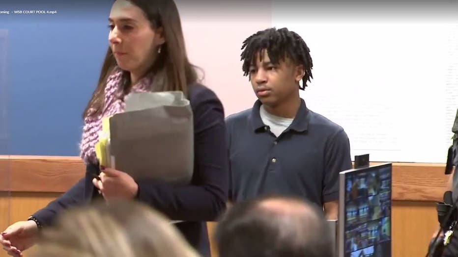 Demetrius Hill enters a plea deal in the deadly November 2022 shooting of 12-year-old Zyion Charles and 15-year-old Cameron Jackson on the 17th Street Bridge during a hearing in a Fulton County courtroom on Nov. 30, 2023.