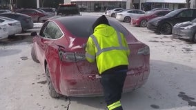 Tesla supercharging station packed in Oak Brook, dead cars line parking lot due to frigid temps