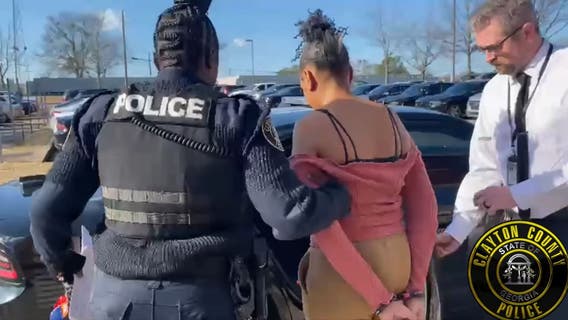 Photos of woman caught hiding in attic after Forest Park deadly shooting released