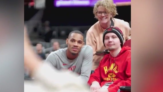 Atlanta Hawks player Dejounte Murray takes time to meet fan