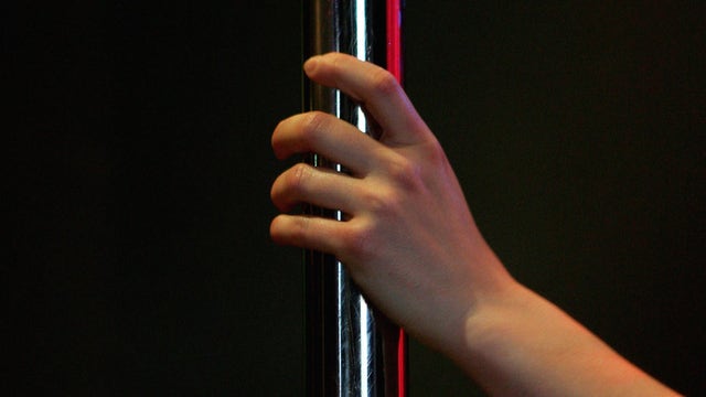 Pole dancing studio defends viral 'Mommy and Me' class allowing kids to try pole techniques with parents