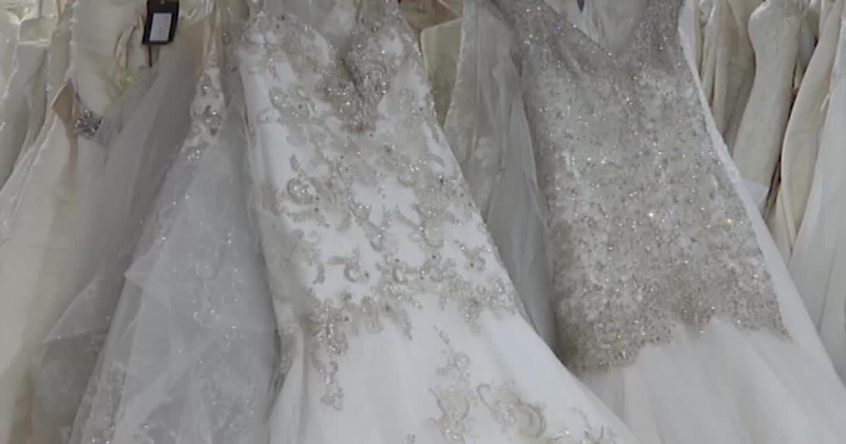 sachin and babi light blue dress Fairy Godmothers' help metro Atlanta brides-to-be with free wedding dresses