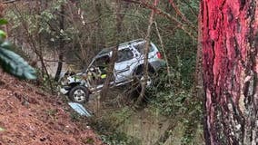 Driver rescued after SUV ends up in creek off Marietta Road in NW Atlanta