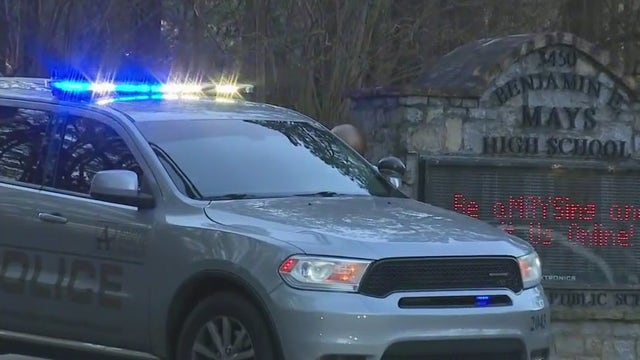 Students return to Benjamin E. Mays High School after Wednesday's shooting