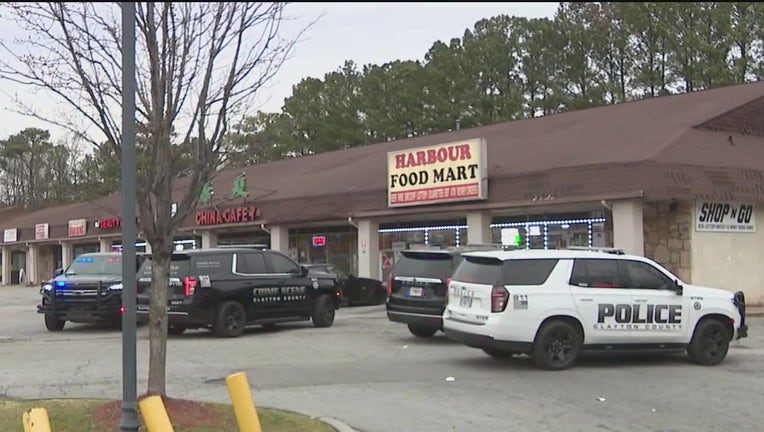 Clayton County police investigate a shooting at a strip mall along Riverdale Road on Feb. 29, 2024.