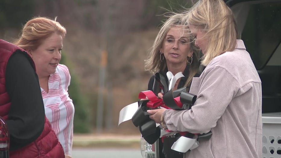 Red and black bows are being sold to honor Laken RIley.