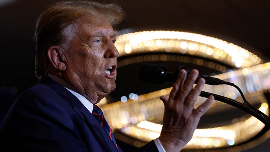 NASHUA, NEW HAMPSHIRE - JANUARY 23: Republican presidential candidate and former U.S. President Donald Trump delivers remarks during his primary night rally at the Sheraton on January 23, 2024 in Nashua, New Hampshire. New Hampshire voters cast their ballots in their states primary election today. With Florida Governor Ron DeSantis dropping out of the race Sunday, former President Donald Trump and former UN Ambassador Nikki Haley are battling it out in this first-in-the-nation primary. (Photo by Chip Somodevilla/Getty Images)