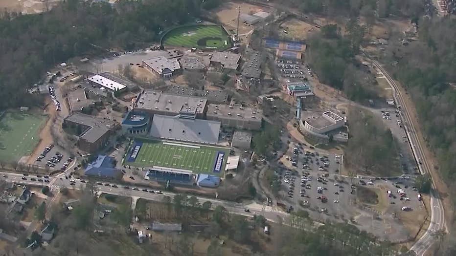 Law enforcement officials flood the area surrounding McEachern High School in Cobb County after a fight among non-students in the parking lot of the campus escalates into gunfire on Feb. 2, 2024.