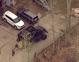 A standoff at a Newnan apartment between a SWAT team and a man wanted for a murder in Meriwether County ends after police find the man dead on March 15, 2024.