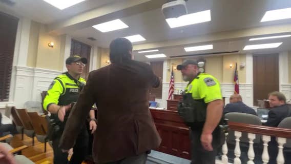 Dueling protests make noise outside Athens City Hall over alleged sanctuary city status