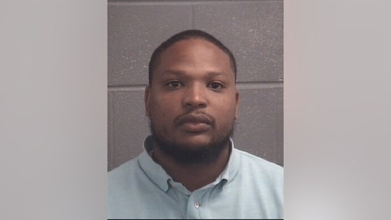 Former Griffin officer accused of improperly investigating brother in murder case turns self in