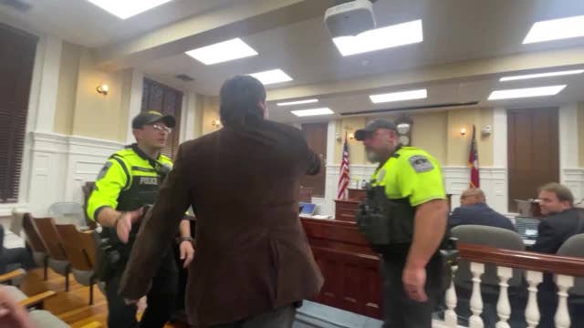 Dueling protests make noise outside Athens City Hall over alleged sanctuary city status