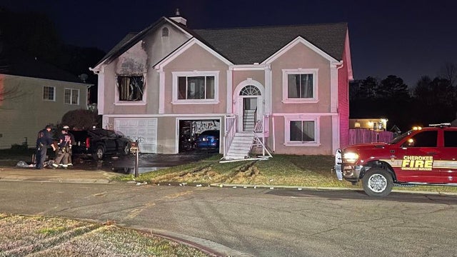 SWAT team pulls man from fire engulfed home after standoff