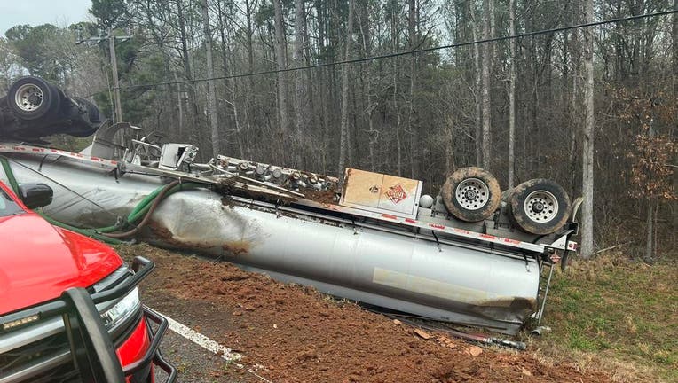A tanker truck carrying gasoline overturned along Highway 53 in Braselton on March 15, 2024.