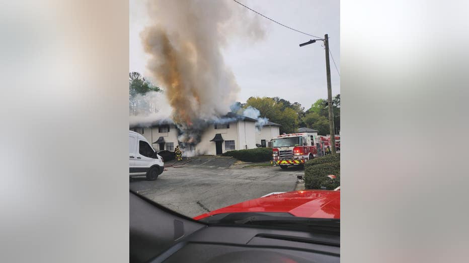 Firefighters believe a grease fire was the cause of an apartment blaze which left 14 people homeless in Mableton on March 31, 2024.