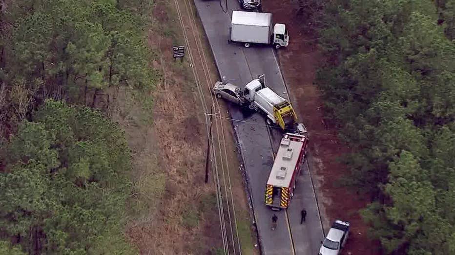 A dump truck crashed head-on into a car along Stone Mountain - Lithonia Road in Stonecrest on March 15, 2024.