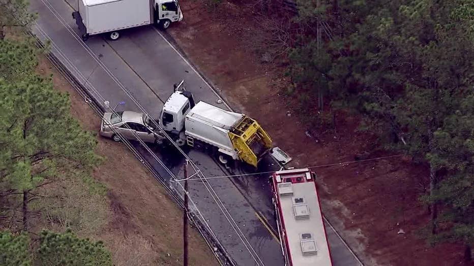 A dump truck crashed head-on into a car along Stone Mountain - Lithonia Road in Stonecrest on March 15, 2024.