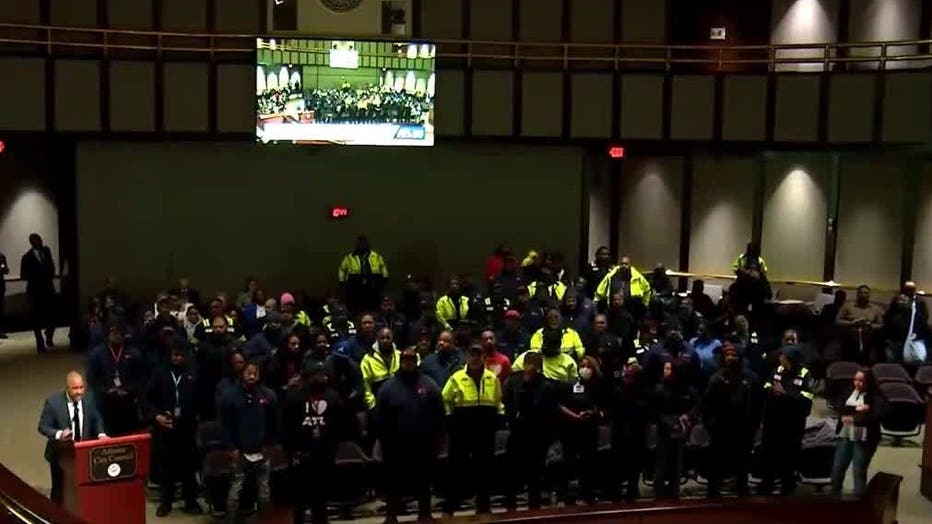 Atlanta airport maintenance workers swarm the Atlanta City Council Transportation Committee on March 13, 2024.