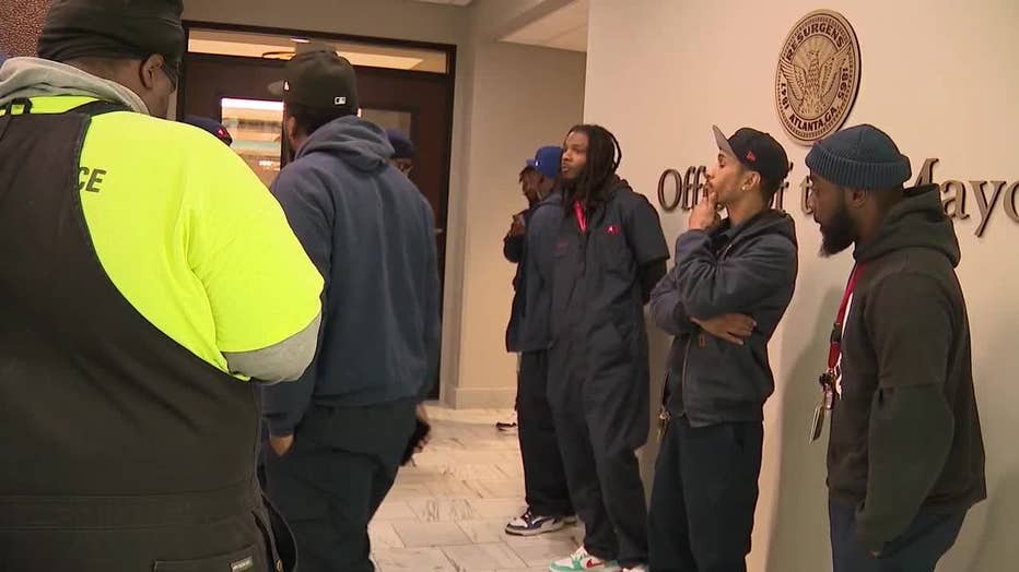 Atlanta airport maintenance workers swarm Mayor Andre Dickens’ office searching for answers on March 13, 2024.