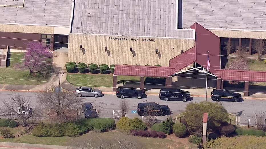 Cobb County Police surround Sprayberry High School after a reported student-on-student stabbing on March 20, 2024.