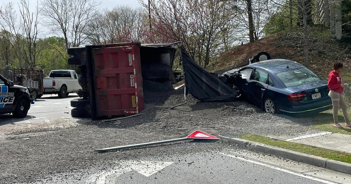Overturned dump truck spills load on I-285 | FOX 5 Atlanta