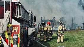 Burn pile spreads fire to Hall County barn