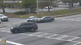 Driver caught on camera hitting car after running red light, Duluth police say