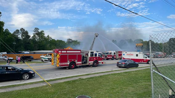 Massive fire in Douglasville destroys auto and tire shops on Highway 5