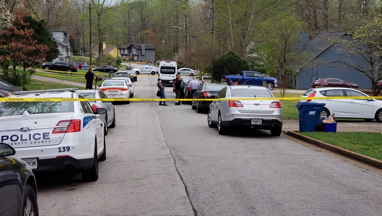 Gwinnett County police find two bodies at a home located at 664 Oxford Hall Drive in Lawrenceville on March 28, 2021.