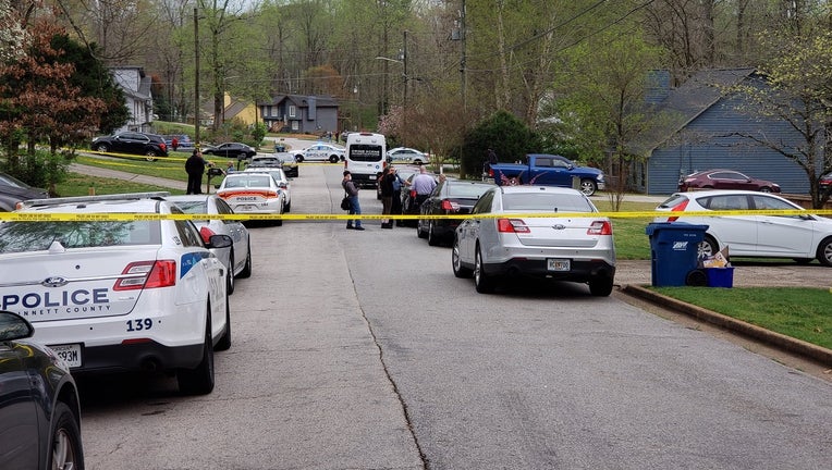 Gwinnett County police find two bodies at a home located at 664 Oxford Hall Drive in Lawrenceville on March 28, 2021.