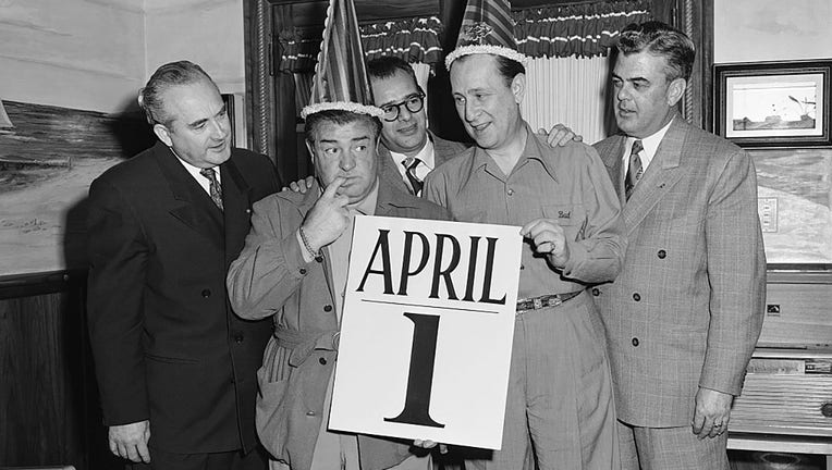FILE - American comedians Bud Abbott (1897 - 1974) and Lou Costello (1906 - 1959) with others on April Fools Day, early 1950s. (Photo by Gene Lester/Getty Images)